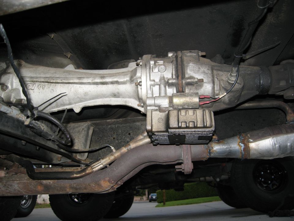 underbody view of vehicle transmission, overdrive unit, and exhaust system