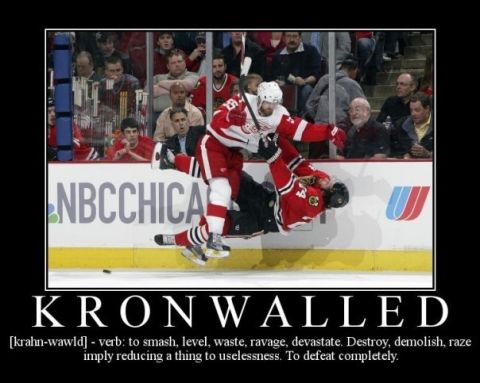 1996 Ford Bronco - A hockey player is body-slammed onto the ice during a game, with spectators in the background.