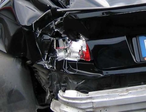 1971 Ford Ranchero - Car sustained heavy rear-end damage, affecting the taillight and bumper structure.