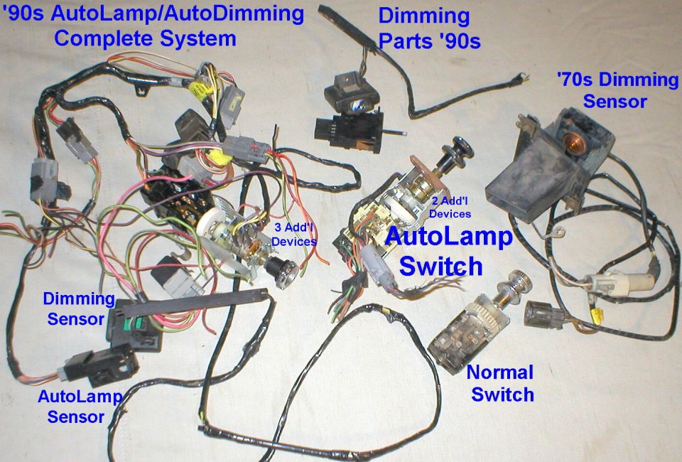 These are the parts I've collected to add some automatic functions.  The functions are actually controlled by the sensor modules through external relays, but the behavior is adjusted by the switch & potentiometers added to the headlight switch or RV mirror.  Some have them as separate dials or slides, like the top parts.