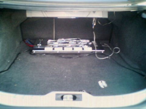 1998 Ford Taurus - cleaned up the wiring in my trunk a bit, prepping for the new subs & box and tons of lighting