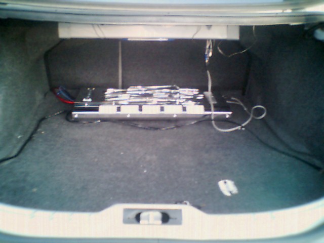cleaned up the wiring in my trunk a bit, prepping for the new subs & box and tons of lighting