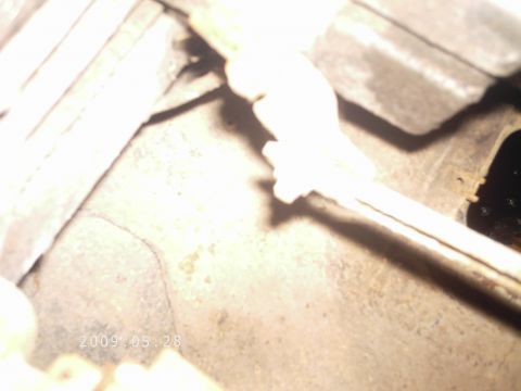 1986 Ford Bronco - A close-up view of an engine component, possibly a sensor or actuator, with a date stamp indicating it was photographed in 2009.