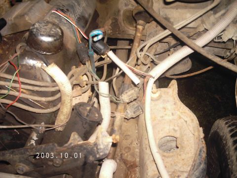 1986 Ford Bronco - Engine bay wiring and components visible in the photo, with a date stamp of 2003.10.01.