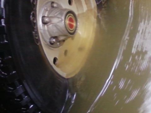 1986 Ford Bronco - 31x11.50x15 driving over a slab in Parke County IN