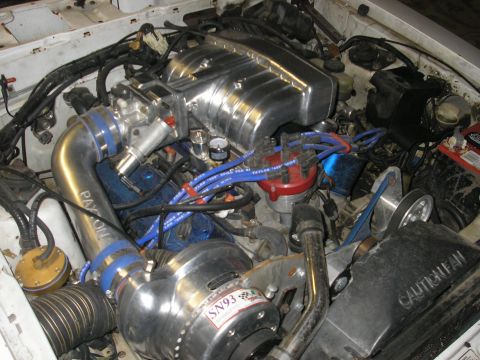 1979 Ford Bronco - my buddy Henri's blown 306 in a '94 drop top.