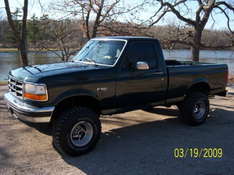 1996 Ford F-150 - This 1996 Ford F-150 pickup truck is shown from the front three-quarter view.