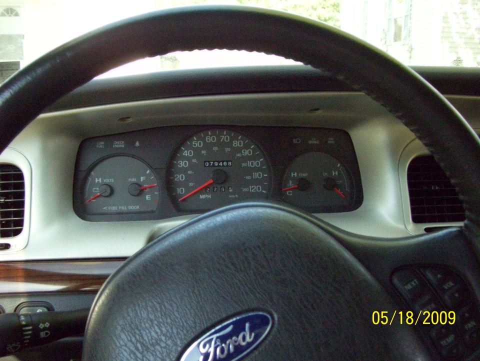 Interior dashboard with Ford logo on steering wheel and odometer reading 079468