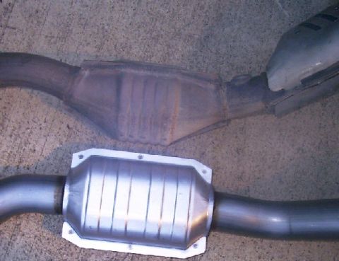2000 Mercury Marquis - Original 2nd Cat to New High Flow Cat. Notice how new cat has a longer element inside.