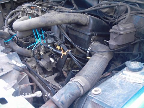 1986 Ford Bronco - i left some random brack off i think it was emissions, block the coil in