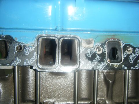 1979 Chevrolet Camaro - Close-up of an Edelbrock gasket on an engine block, showing intake ports.