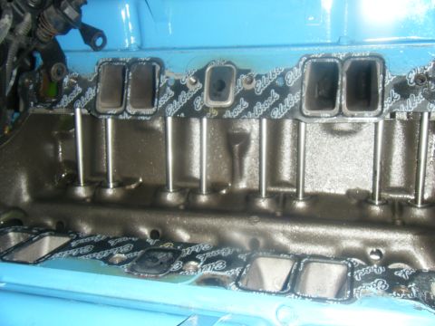 1979 Chevrolet Camaro - Close-up of an engine's intake manifold gasket, revealing the 'Edelbrock' brand and internal engine components.