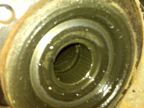 1992 Ford F-350 - This image shows a close-up view of a wheel hub, revealing its internal splined structure, likely for a drive axle connection.