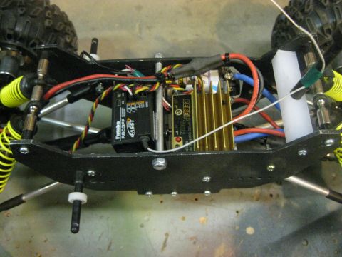 2010 Ford Pickup - Close-up of an RC car chassis with electronic components visible.