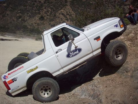 1995 Ford Bronco - This 1995 Ford Bronco is captured mid-climb on a , rocky trail.