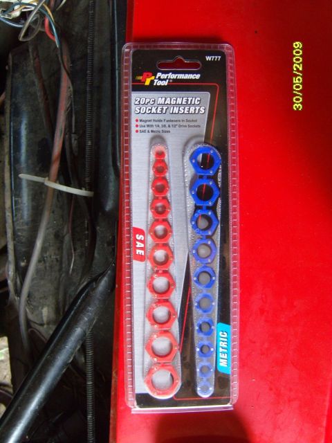 1989 Ford Bronco - A set of magnetic socket inserts, both SAE and metric sizes, is displayed in its packaging.