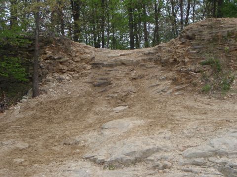 1996 Ford Bronco - Rocky off-road trail with trees and a Supermotors.net watermark.