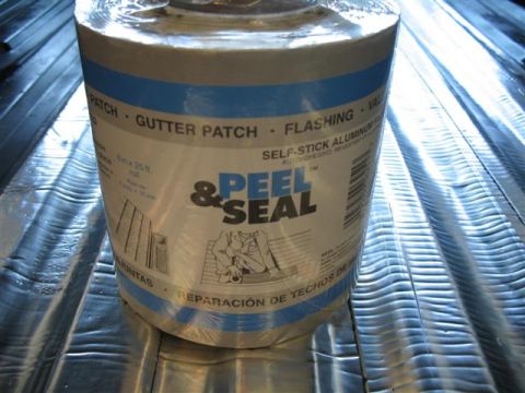 1992 Ford Bronco - A roll of Peel & Seal self-stick aluminum flashing (6 in x 25 ft) marketed for gutter patch, flashing and roof repair, sitting on a sheet o…