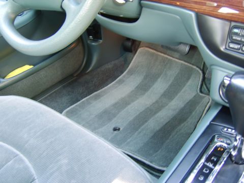 1996 Mercury Grand Marquis - 2 floor mats?? :p The factory original mats are on the bottom. The mat on top is a matching Ford OEM replacement. Although they are the cor…