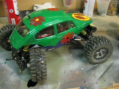 2010 Ford Pickup - This remote-controlled vehicle features a custom paint job with flowers and a peace symbol.
