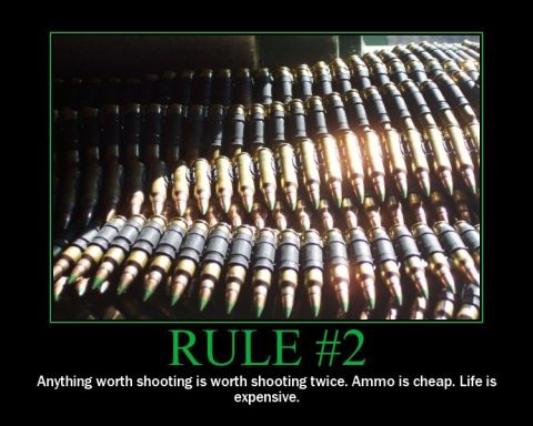 1988 Ford Bronco - Ammunition belts are displayed with a motivational quote about shooting and the cost of ammo.