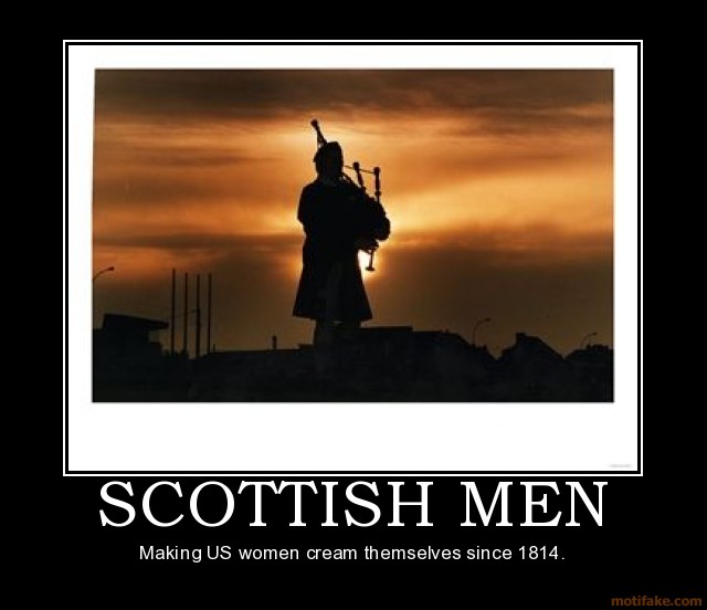 Silhouette of a bagpiper against a sunset sky