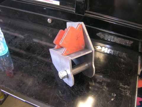1996 Ford Bronco - Custom metal bracket with magnets, likely for welding or fabrication work.