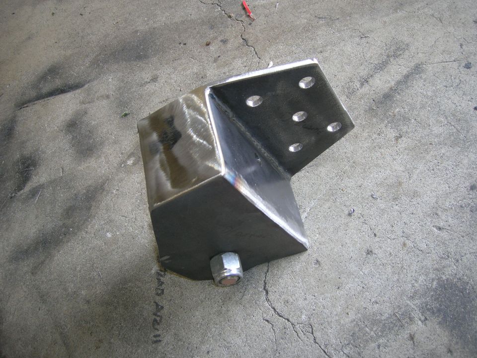 Metal bracket with bolt on concrete floor