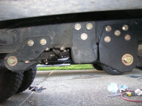 1996 Ford Bronco - Custom suspension bracket installation on a vehicle frame.