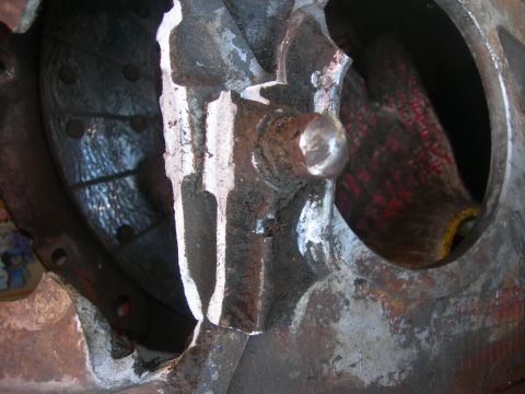 1984 Ford Bronco - This is a close-up view of a vehicle's clutch assembly, revealing the pressure plate and friction disc components.