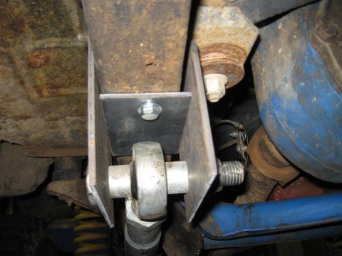 1978 Ford Bronco - Undercarriage view of a custom suspension part, likely a modification to a vehicle's frame.