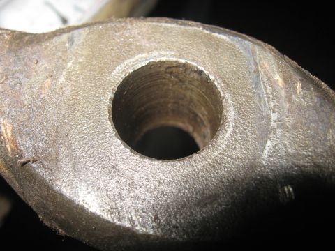 1978 Ford Bronco - A close-up view of a metal component, showing a central bore with visible machining marks.