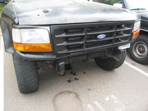 1986 Ford Bronco - The grille and headlight design indicate this is a 1992-1996 Ford Bronco, not a 1986 model.