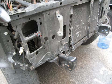 1986 Ford Bronco - Front end damage on a 1986 Ford Bronco shows the radiator and structural components.