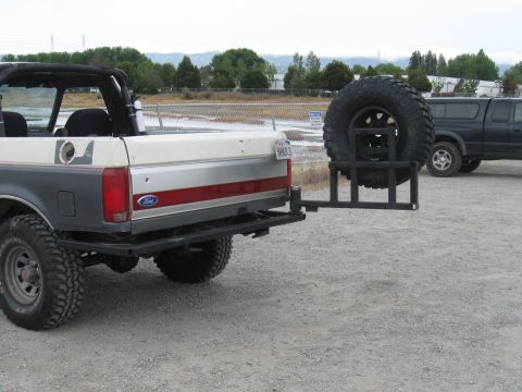1991 Ford Bronco - This 1991 Ford Bronco features a rear-mounted spare tire carrier and a two-tone paint scheme.