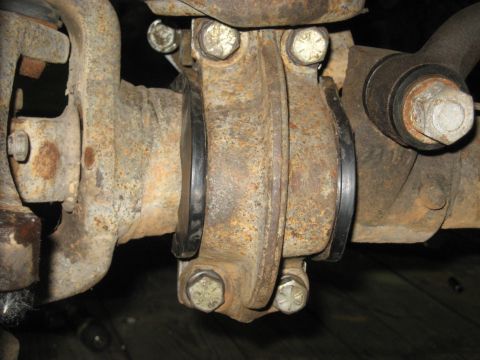1978 Ford Bronco - This image shows a close-up view of a vehicle's driveshaft U-joint, which appears to be heavily rusted.