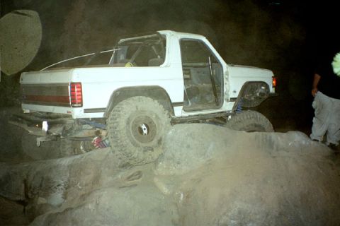 1994 Ford Bronco - Modified 1994 Ford Bronco tackling rocky terrain, doors off for better visibility.
