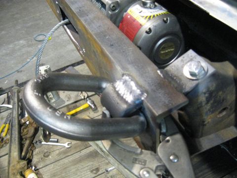 1978 Ford Bronco - Custom tow hitch shackle and winch assembly mounted on a metal frame.