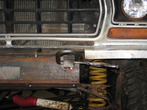 1978 Ford Bronco - Welding a tow hook onto the frame of a 1978 Ford Bronco.