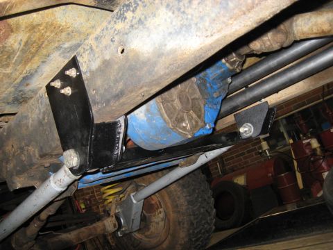 1978 Ford Bronco - Custom suspension and drivetrain components are visible on the underside of this vehicle.