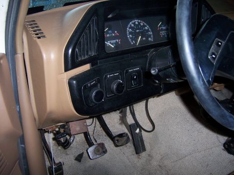 1991 Ford Bronco - Interior view of a 1991 Ford Bronco dashboard, showing the instrument cluster and controls.