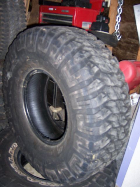 1991 Ford Bronco - This is a close-up view of a single off-road tire, not a 1991 Ford Bronco.