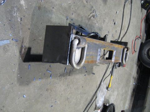 1978 Ford Bronco - This is a custom-fabricated metal component, likely a part for a vehicle or equipment, prominent tow hooks.