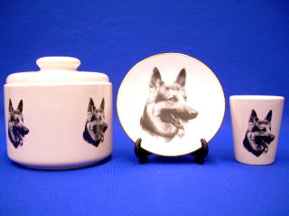 1991 Ford LTD Crown Victoria - A set of ceramic items German Shepherd portraits is displayed against a solid blue backdrop.
