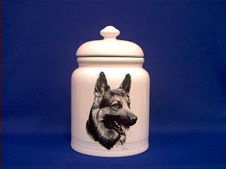 1991 Ford LTD Crown Victoria - A ceramic cookie jar decorated with the image of a German Shepherd is displayed against a solid blue background.