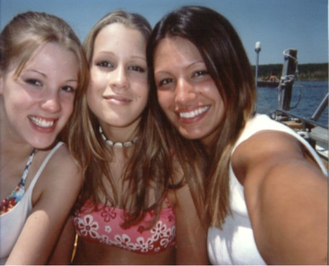 1990 Ford Taurus - Three women enjoying a day out on the water.