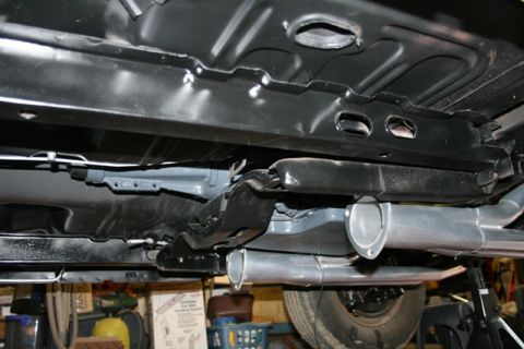 1971 Ford Ranchero - Undercarriage view of a vehicle, showing exhaust system and frame components. SuperMotors logo present.
