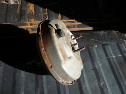 1975 Ford Ranchero - A used brake booster is shown, likely removed from a vehicle for repair or salvage.