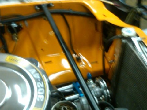 1978 Ford Mustang II - Engine bay details including air cleaner and radiator, possibly from a 1978 vehicle.