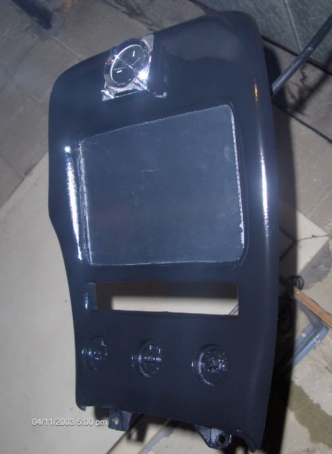 1993 Ford Probe - Dashboard section with analog clock and screen opening, possibly for aftermarket installation.